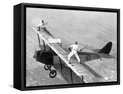Daredevils Playing Tennis on a Biplane - Black Framed Canvas Print Wall Art, 16x12